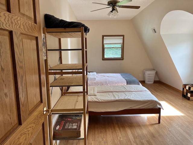 7033 N M-140, Watervliet, MI 49098 - bedroom featuring wood finished floors, baseboards, and a ceiling fan