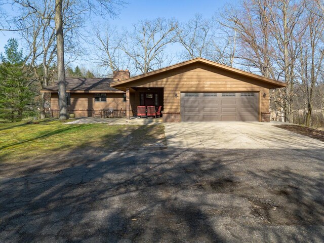 10989 E D E Ave, Richland, MI 49083 - view of front of property featuring a chimney and driveway