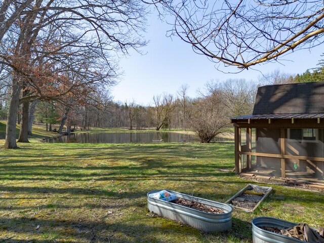 10989 E D E Ave, Richland, MI 49083 - view of green lawn with a water view, exterior structure, and an outbuilding