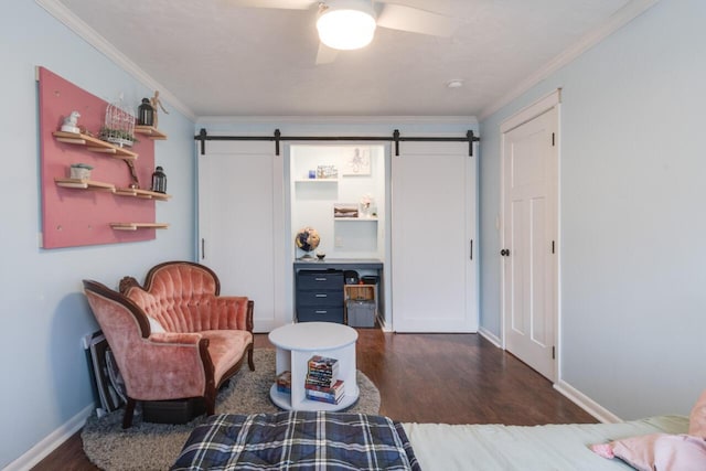 10989 E D E Ave, Richland, MI 49083 - sitting room with a barn door, dark wood-style floors, crown molding, and ceiling fan