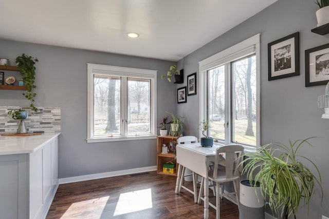 10989 E D E Ave, Richland, MI 49083 - dining room with dark wood finished floors, a desk, recessed lighting, and baseboards