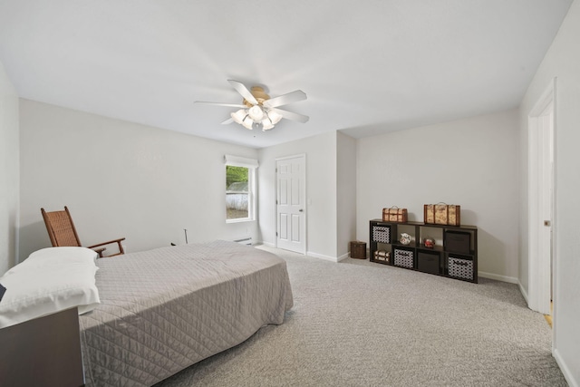 12021 Pope Church Rd, Springport, MI 49284 - bedroom with carpet, baseboards, a ceiling fan, and a closet