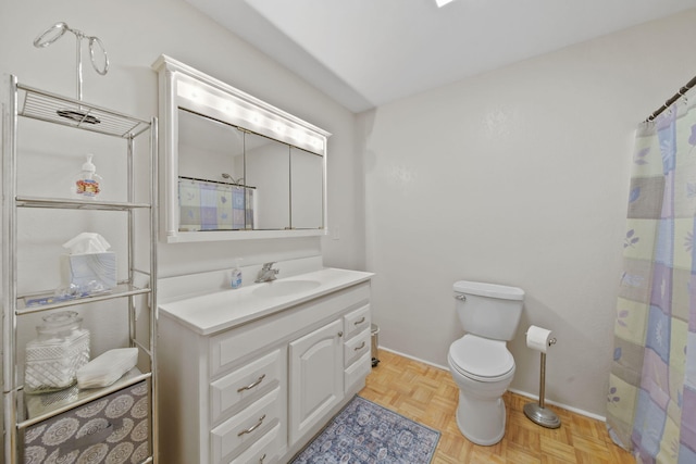 12021 Pope Church Rd, Springport, MI 49284 - full bathroom with vanity, toilet, baseboards, and a shower with shower curtain