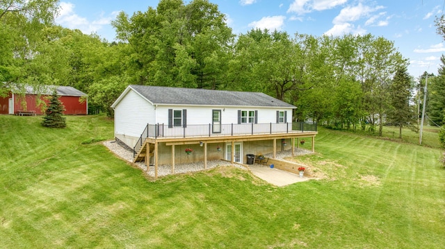 12021 Pope Church Rd, Springport, MI 49284 - back of house with french doors, a deck, a lawn, and a patio
