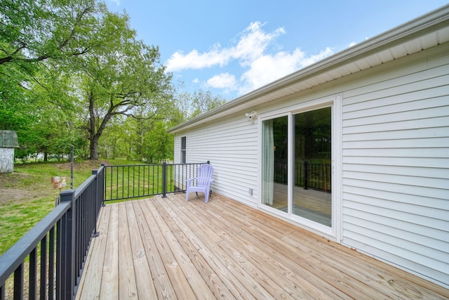 12021 Pope Church Rd, Springport, MI 49284 - wooden deck with a lawn