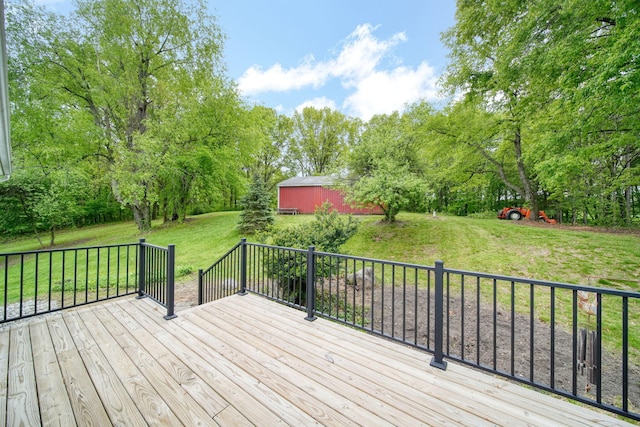 12021 Pope Church Rd, Springport, MI 49284 - wooden deck featuring a lawn and view of scattered trees