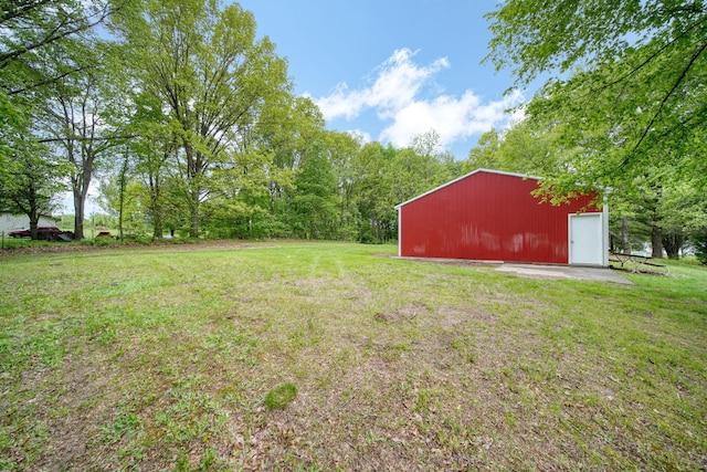 12021 Pope Church Rd, Springport, MI 49284 - view of grassy yard with a pole building and an outdoor structure