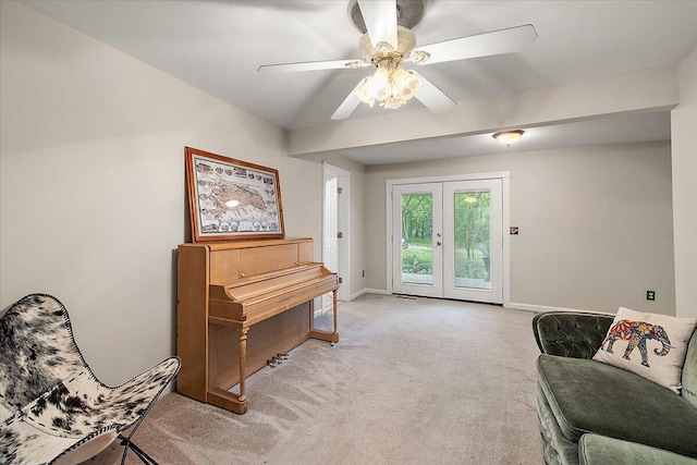 236 Simpson St, Grass Lake, MI 49240 - sitting room featuring light carpet, french doors, baseboards, and a ceiling fan