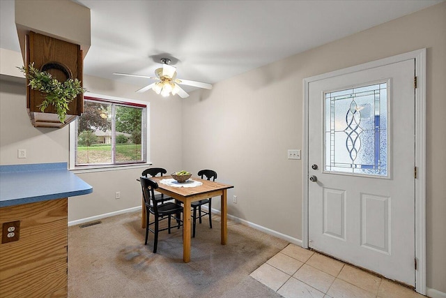 236 Simpson St, Grass Lake, MI 49240 - dining space with baseboards, ceiling fan, and light carpet