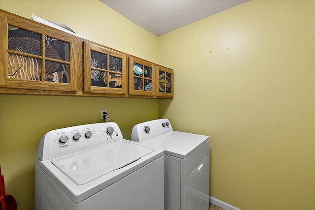 236 Simpson St, Grass Lake, MI 49240 - washroom with washing machine and clothes dryer and cabinet space