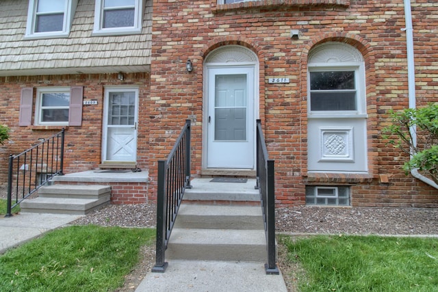 2611 Kingstowne Dr, Michigan, MI 48390 - doorway to property featuring brick siding