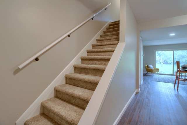 2611 Kingstowne Dr, Michigan, MI 48390 - stairs with wood finished floors, baseboards, and recessed lighting