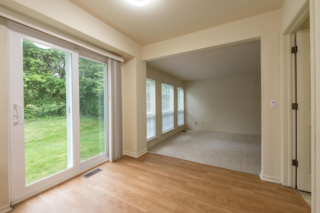 3048 Turnberry Ln, Ann Arbor, MI 48108 - empty room featuring light wood-style floors and baseboards