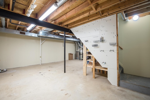 3048 Turnberry Ln, Ann Arbor, MI 48108 - unfinished basement with a workshop area and heating unit