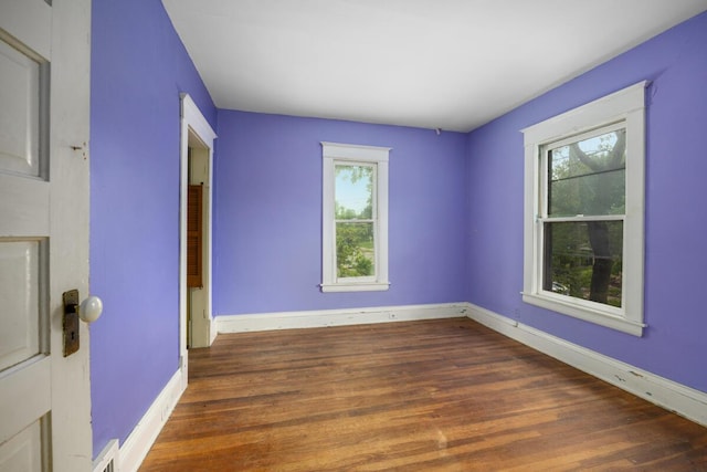 554 Ethel Ave SE, Grand Rapids, MI 49506 - unfurnished room featuring wood finished floors and baseboards