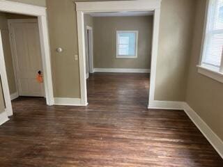 872 Mcalister Ave, Benton Harbor, MI 49022 - corridor with plenty of natural light, baseboards, and wood finished floors