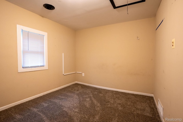 26640 Pattow St, Roseville, MI 48066 - empty room with dark carpet, baseboards, and attic access