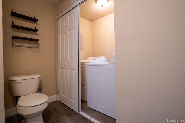 26640 Pattow St, Roseville, MI 48066 - half bath with washer / clothes dryer, wood finished floors, toilet, and baseboards