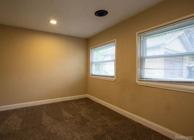 26640 Pattow St, Roseville, MI 48066 - spare room with dark colored carpet, baseboards, and recessed lighting