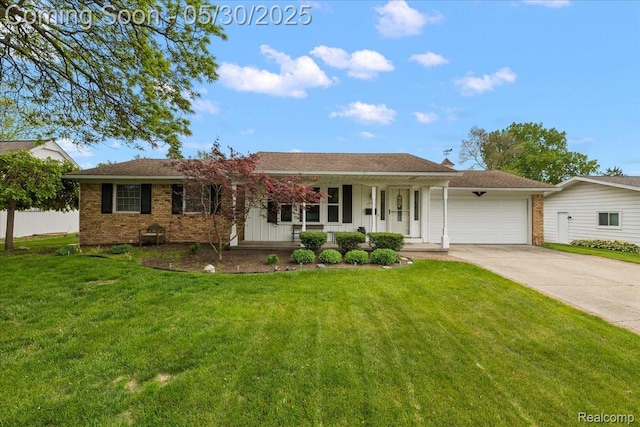 7188 Vicksburg Cir, Shelby Twp, MI 48317 - ranch-style home featuring covered porch, a garage, driveway, and brick siding
