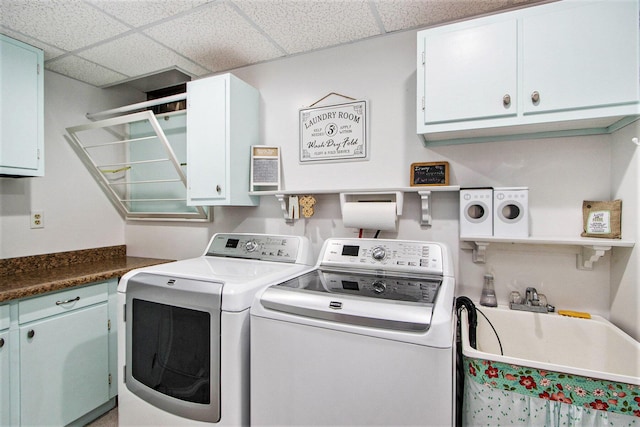 9490 N 12th St, Kalamazoo, MI 49009 - laundry area with washing machine and clothes dryer and cabinet space