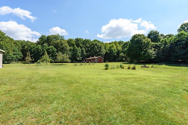 9490 N 12th St, Kalamazoo, MI 49009 - view of yard featuring a wooded view