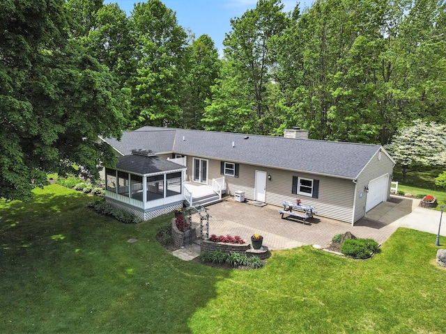 9490 N 12th St, Kalamazoo, MI 49009 - rear view of property with a wooden deck, a chimney, a lawn, and a shingled roof