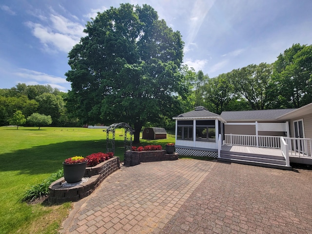 9490 N 12th St, Kalamazoo, MI 49009 - view of patio featuring a deck and view of scattered trees