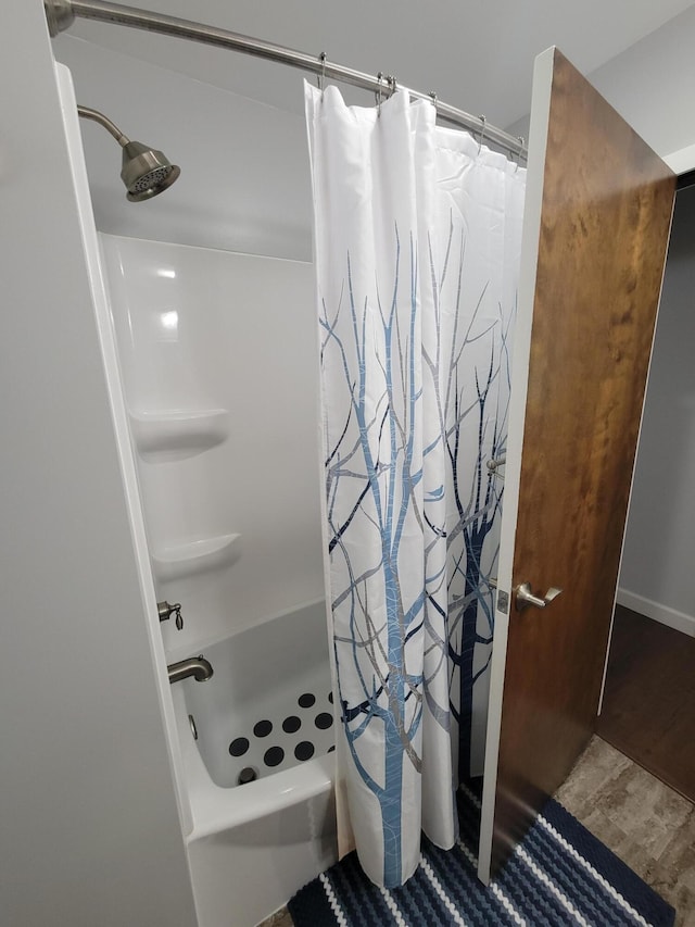 9490 N 12th St, Kalamazoo, MI 49009 - full bathroom featuring a shower with curtain and wood finished floors