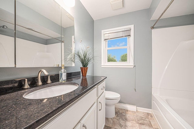 7432 Burlingame Ave SW, Byron Center, MI 49315 - bathroom with vanity, toilet, baseboards, and washtub / shower combination