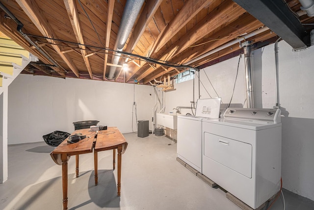7432 Burlingame Ave SW, Byron Center, MI 49315 - unfinished basement with washing machine and clothes dryer and a sink