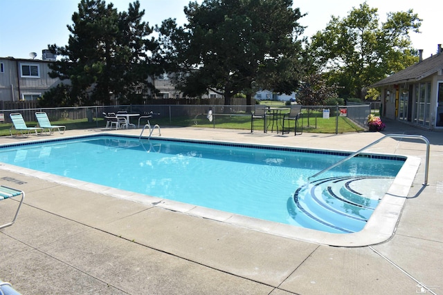 434 Riverbend Dr, Milan, MI 48160 - community pool with a patio