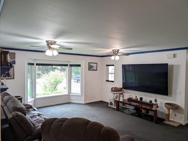 6919 Abrahamson Rd, Ludington, MI 49431 - living room with ceiling fan, carpet flooring, and baseboards
