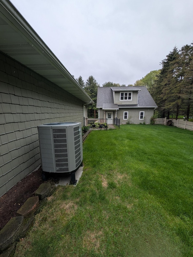 6919 Abrahamson Rd, Ludington, MI 49431 - view of yard with central AC