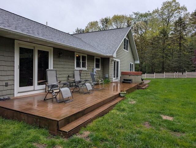 6919 Abrahamson Rd, Ludington, MI 49431 - wooden deck with a hot tub