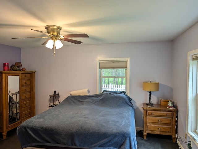 6919 Abrahamson Rd, Ludington, MI 49431 - bedroom featuring a ceiling fan