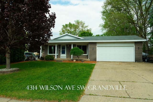 4314 Wilson Ave SW, Grandville, MI 49418 - single story home with an attached garage, driveway, a front yard, brick siding, and a porch