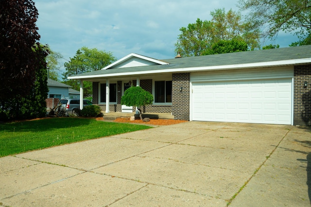 4314 Wilson Ave SW, Grandville, MI 49418 - ranch-style house featuring brick siding, concrete driveway, a garage, a front yard, and a porch
