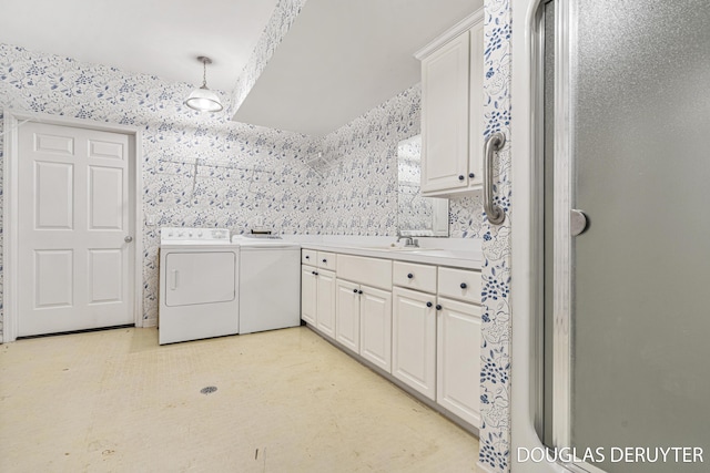 7470 Parmalee Rd, Middleville, MI 49333 - laundry area with cabinet space, wallpapered walls, and washer and dryer