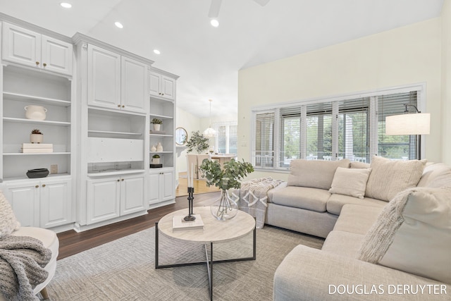 7470 Parmalee Rd, Middleville, MI 49333 - living area featuring dark wood-type flooring, a ceiling fan, recessed lighting, and lofted ceiling