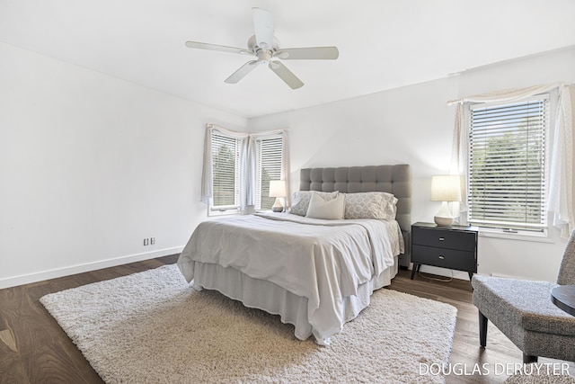 7470 Parmalee Rd, Middleville, MI 49333 - bedroom with baseboards, wood finished floors, and a ceiling fan