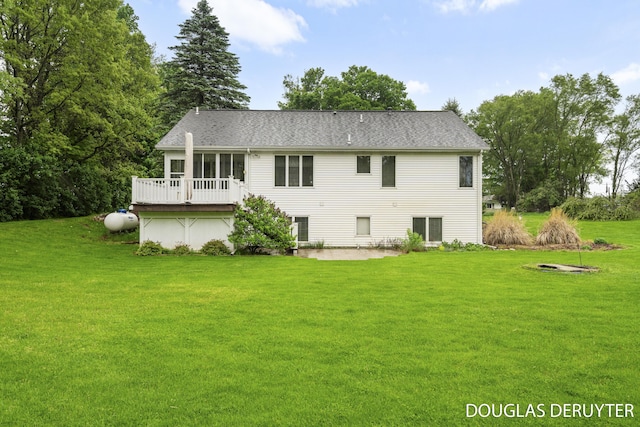 7470 Parmalee Rd, Middleville, MI 49333 - back of house with a lawn, a sunroom, a deck, and a patio