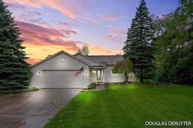 7470 Parmalee Rd, Middleville, MI 49333 - view of front of home featuring a garage, driveway, a yard, and a shingled roof