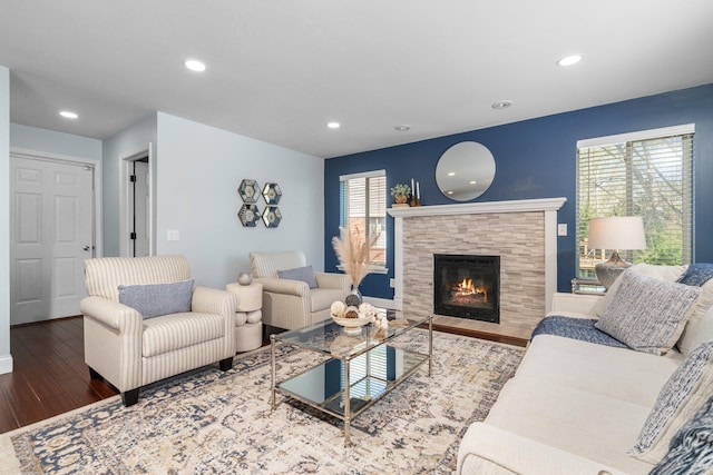 4139 Persimmon Dr, Ypsilanti, MI 48197 - living area featuring wood finished floors, recessed lighting, and a tiled fireplace