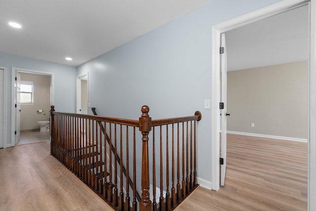 4139 Persimmon Dr, Ypsilanti, MI 48197 - corridor featuring an upstairs landing, wood finished floors, baseboards, and recessed lighting