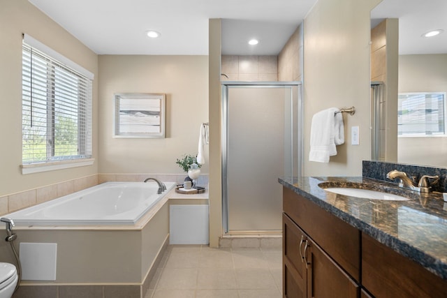 4139 Persimmon Dr, Ypsilanti, MI 48197 - bathroom featuring vanity, a stall shower, a bath, tile patterned floors, and recessed lighting