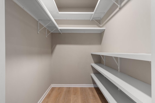 4139 Persimmon Dr, Ypsilanti, MI 48197 - spacious closet featuring wood finished floors