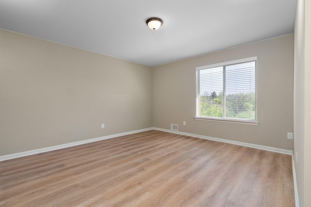 4139 Persimmon Dr, Ypsilanti, MI 48197 - unfurnished room with light wood-style flooring and baseboards