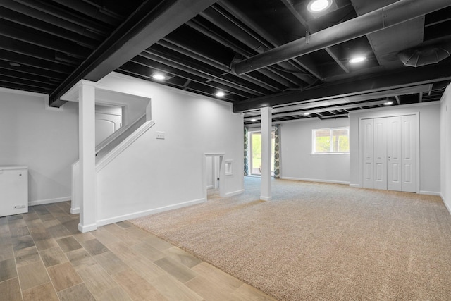 4139 Persimmon Dr, Ypsilanti, MI 48197 - below grade area with baseboards and wood finished floors