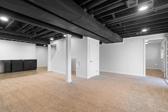 4139 Persimmon Dr, Ypsilanti, MI 48197 - finished basement featuring light colored carpet and baseboards